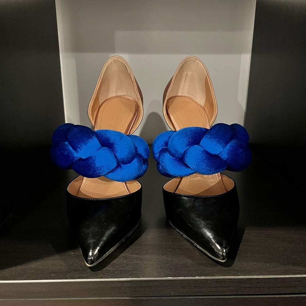 Black patent leather, satin, and velvet pumps. Approx 4.5 inch heel height.